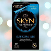 A black and blue box of LifeStyles SKYN Elite Extra Lubricated Condoms (Latex-Free) is shown against a blurred background with circular light spots. The box highlights features such as "Non-Latex," "Thinner & Softer," "Elite Extra Lube," made from SKYNFEEL material, and mentions 12 lubricated polyisoprene condoms inside.